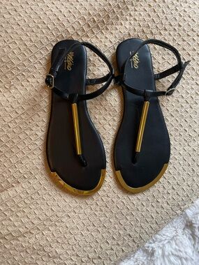 WASSIO Black Leather T-Strap Sandals with Gold Accent